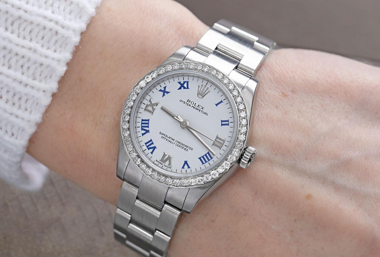 Rolex Oyster Perpetual White Dial Blue Numerals Ladies SS Watch In Excellent Condition For Sale In New York, NY