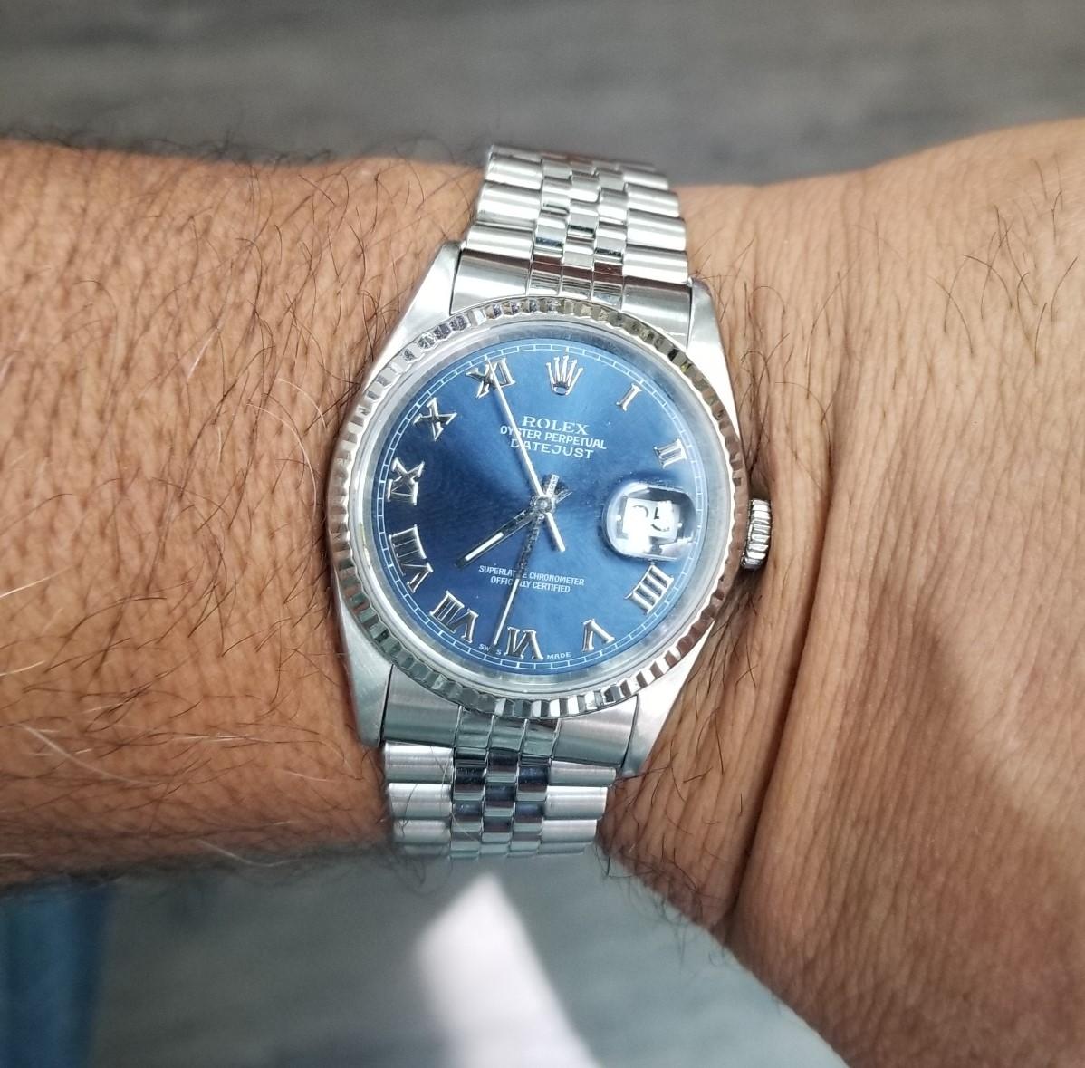 Rolex Date 34mm Blue Dial Roman Numeral
Accent Dial Jubilee Band 
Creator: Rolex
Design: Datejust Watch Datejust Collection
Case Material:  Stainless Steel
Strap Material:  Stainless Steel
Serial number: X394108
Case Shape: Round
Case Dimensions: