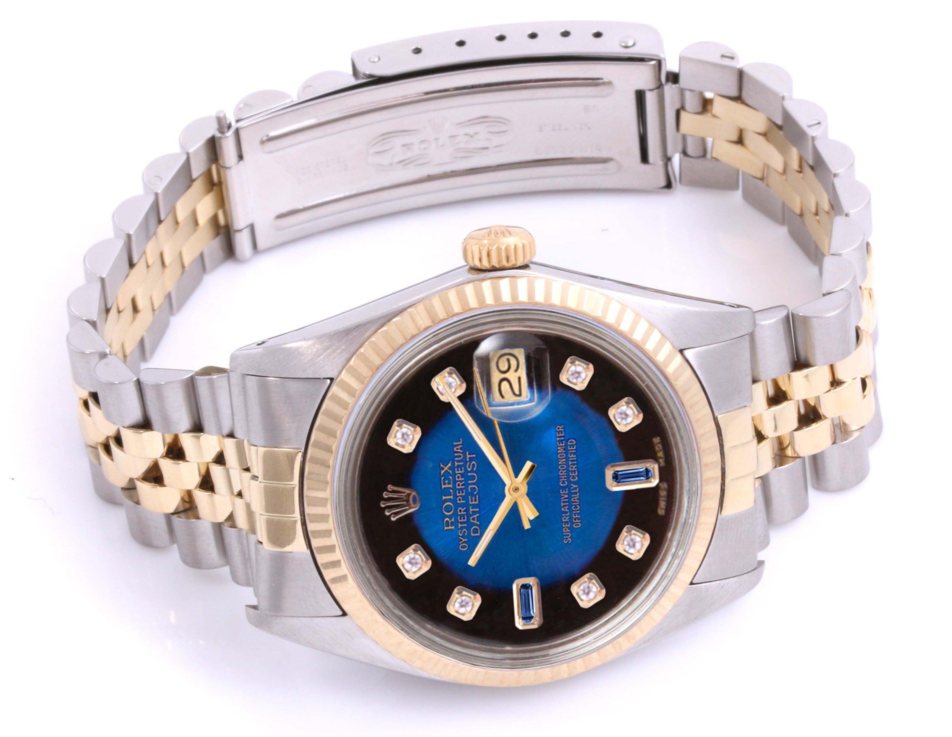 (Watch Description)
Brand - Rolex
Gender - Unisex
Model - 16013 Datejust
Metals - Yellow Gold / Steel 
Case size - 36mm
Bezel -Yellow Gold Diamond
Crystal - Sapphire
Movement - Automatic caliber 3035
Dial - Finished Blue Diamond
Wrist band - Two