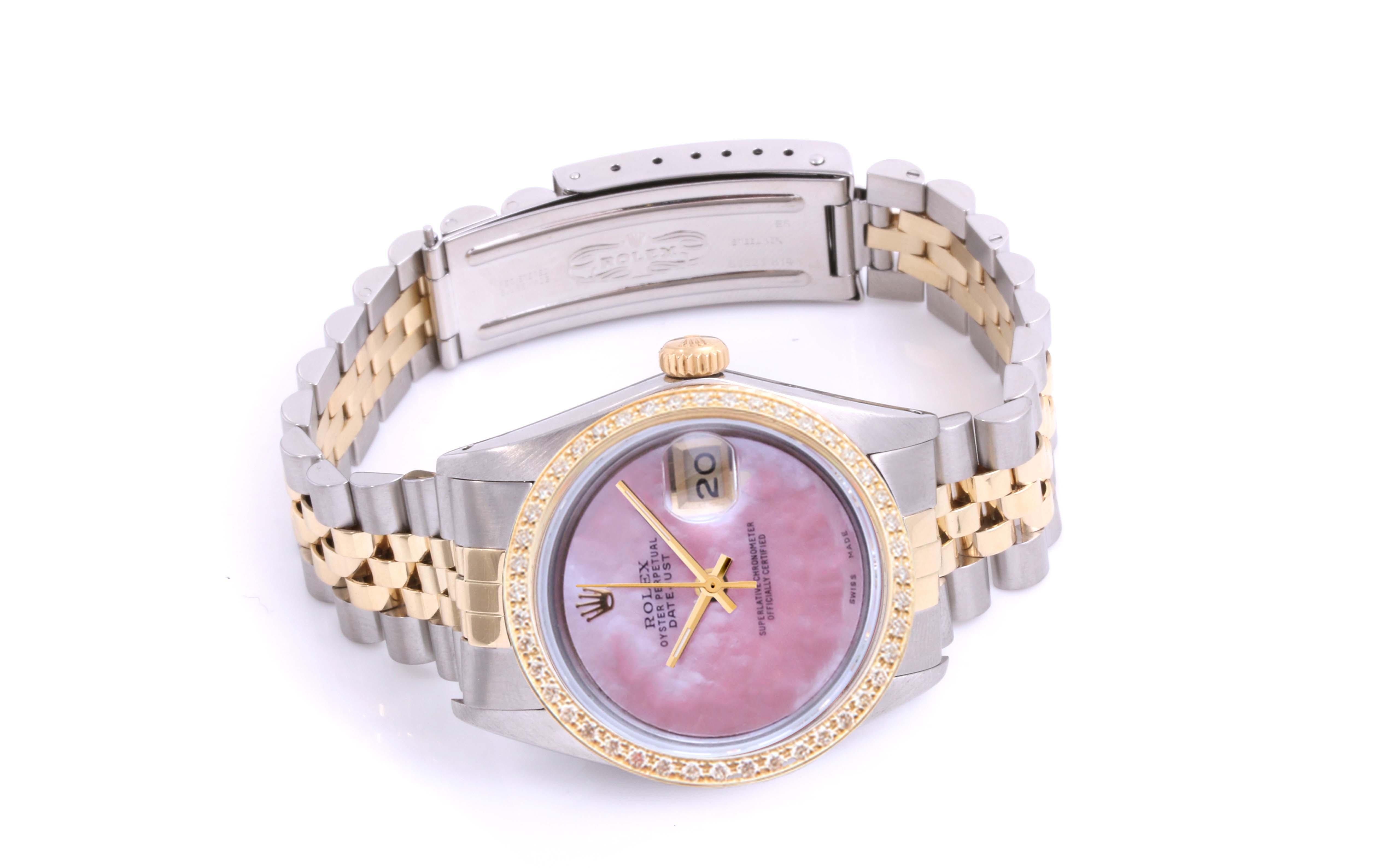 (Watch Description) 
Brand - Rolex
Gender - Unisex 
Model - 16013 Datejust
Metals - Yellow Gold / Stainless steel
Case size - 36mm
Bezel - Yellow Gold Diamond
Crystal - Sapphire
Movement - Automatic Cal.3035
Dial - Refinished Pink MOP
Wrist band -