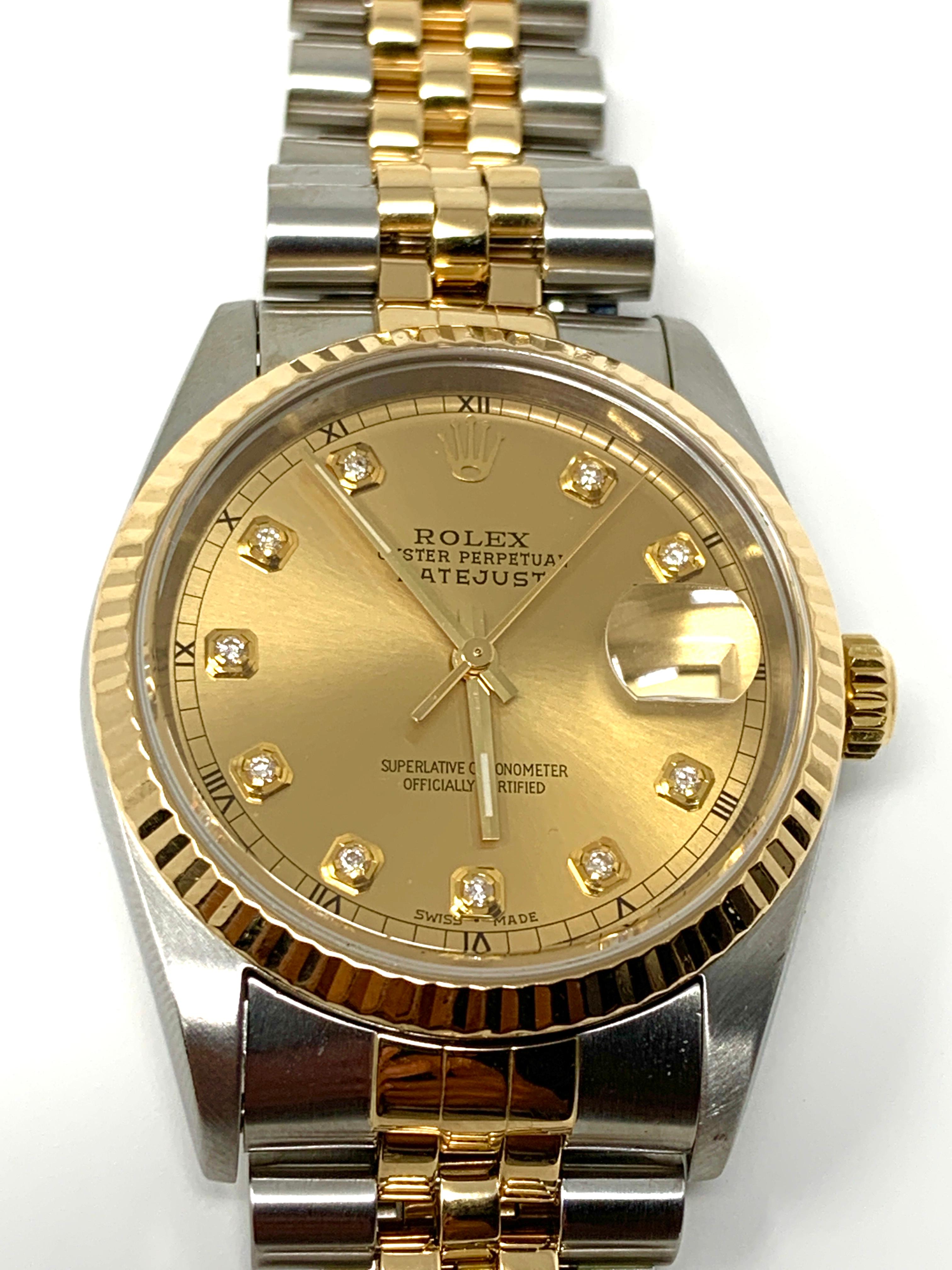 (Watch Description)
Brand - Rolex 
Gender - Unisex
Metals - Yellow Gold / Steel 
Model - Datejust 16233
Case size - 36mm
Dial - champagne diamond
Bezel - Yellow Gold Fluted 
Crystal - Sapphire
Movement - Automatic Cal-3135
Wrist size - 7 1/2 Inches