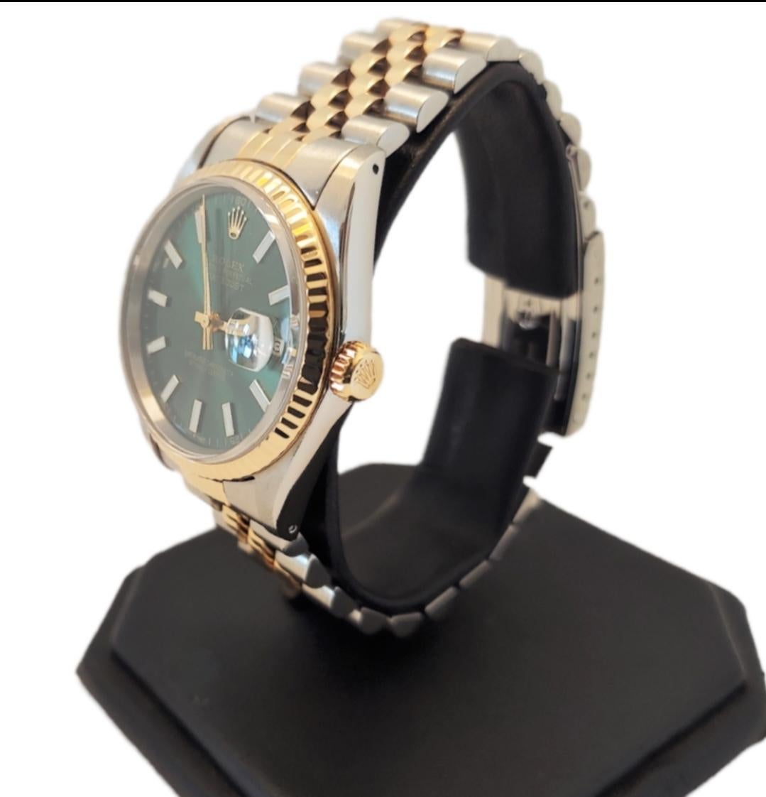 Brand - Rolex
Gender - Unisex
Model - 16233 Datejust
Metals - Yellow Gold/Stainless steel
Case size - 36mm
Bezel - Yellow gold fluted.
Crystal - sapphire
Movement - Automatic cal 3135
Dial - Green stick Index
Wrist band - Two-Tone jubilee
Wrist size