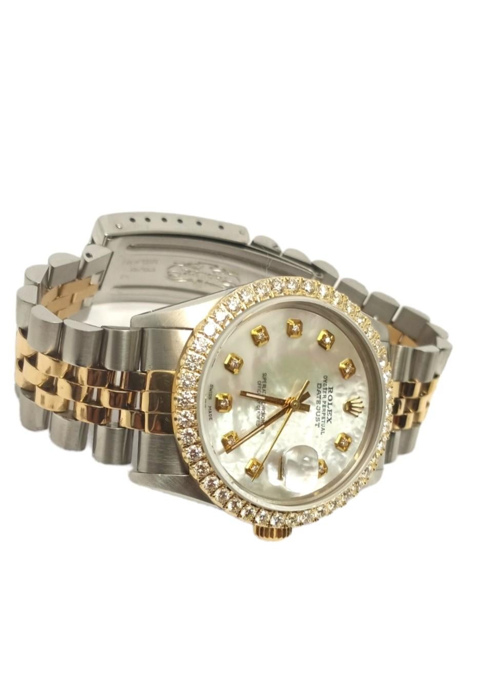 Brand - Rolex
Gender - Mens
Model - 16233 datejust
Condition - pre owned
Metals - Yellow Gold/Stainless steel
Case size - 36mm
Bezel - Steel 2.0 CT diamond
Crystal - sapphire
Movement - Automatic cal 3135
Dial - Refinished Red diamond
Wrist band -