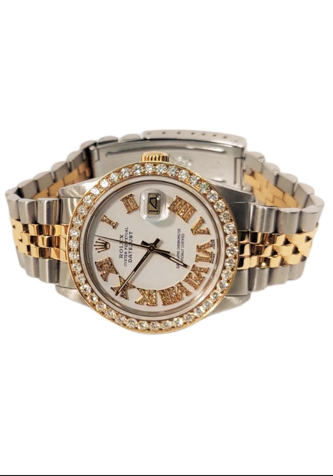 (Watch Description)
Brand-Rolex
Model-16233 Datejust
Case size - 36mm
Metals - steel / Yellow gold
Bezel - Custom 2.0Ct yellow gold diamond 
Dial - Custom white roman numeral Diamon
Band - Two tone Jubilee. 
Movement - Rolex Cal-3135 automatic
Wrist