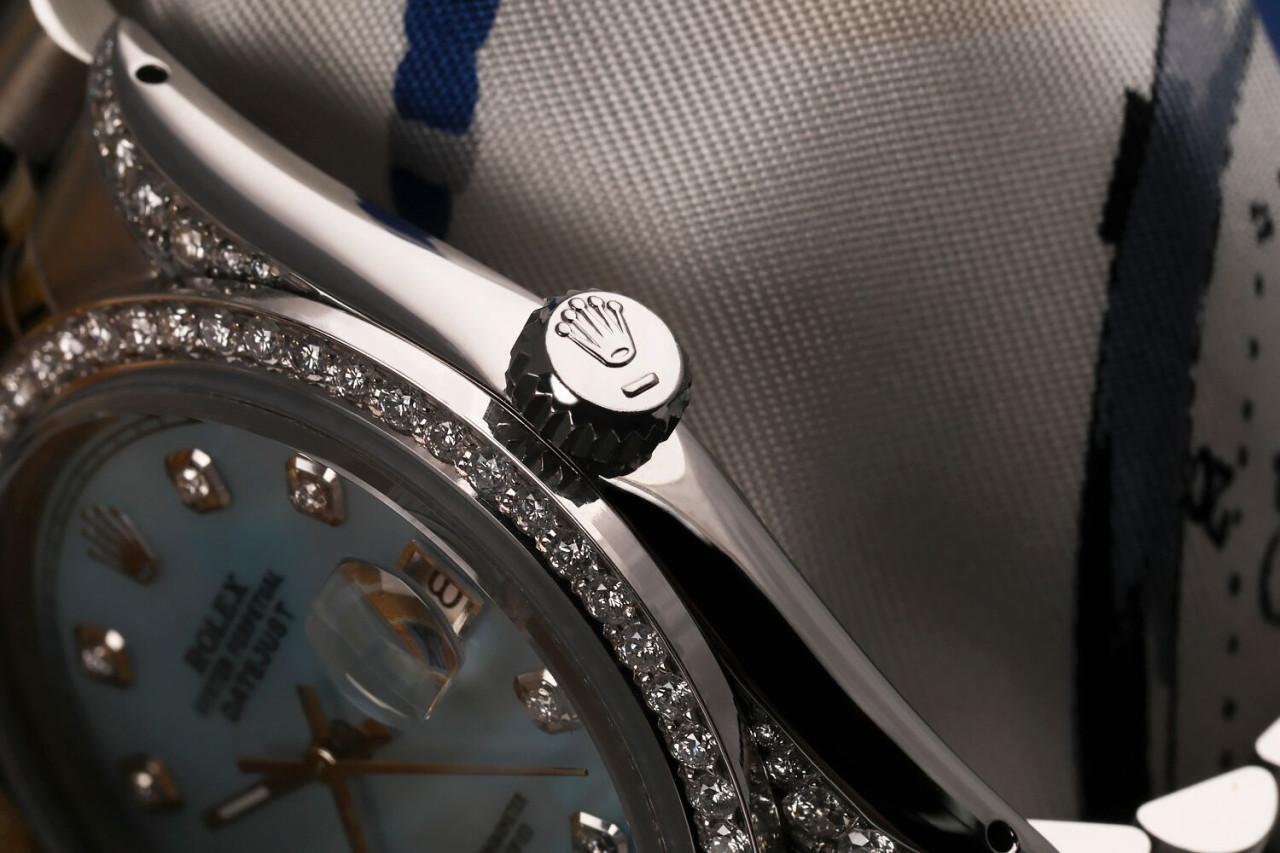 Rolex 36mm Datejust Baby Blue Mother Of Pearl Diamond Dial Bezel & Lugs Model 16014

Cette montre est dans un état comme neuf. Elle a été polie, entretenue et ne présente aucune rayure ou imperfection visible. Toutes nos montres bénéficient d'une