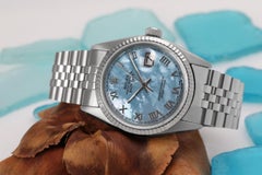 Rolex Datejust Baby Blue Mother of Pearl Roman Numeral Dial with 18k Fluted