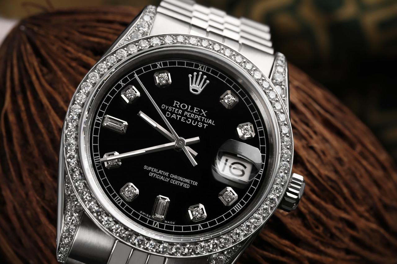 Rolex Datejust 36mm Custom Black Diamond Dial Baguette 6&9, Diamond Bezel and Diamond Lugs. Stainless Steel Watch with Jubilee Band 16014

This watch is in like new condition. It has been polished, serviced and has no visible scratches or blemishes.