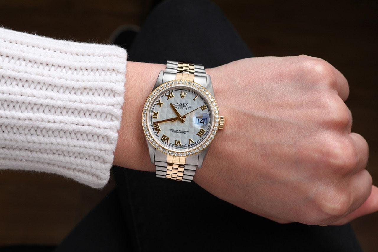 Rolex 36mm Datejust Diamond Bezel Cream Pyramid Roman Dial Two Tone Watch

We take great pride in presenting this timepiece, which is in impeccable condition, having undergone professional polishing and servicing to maintain its pristine appearance.