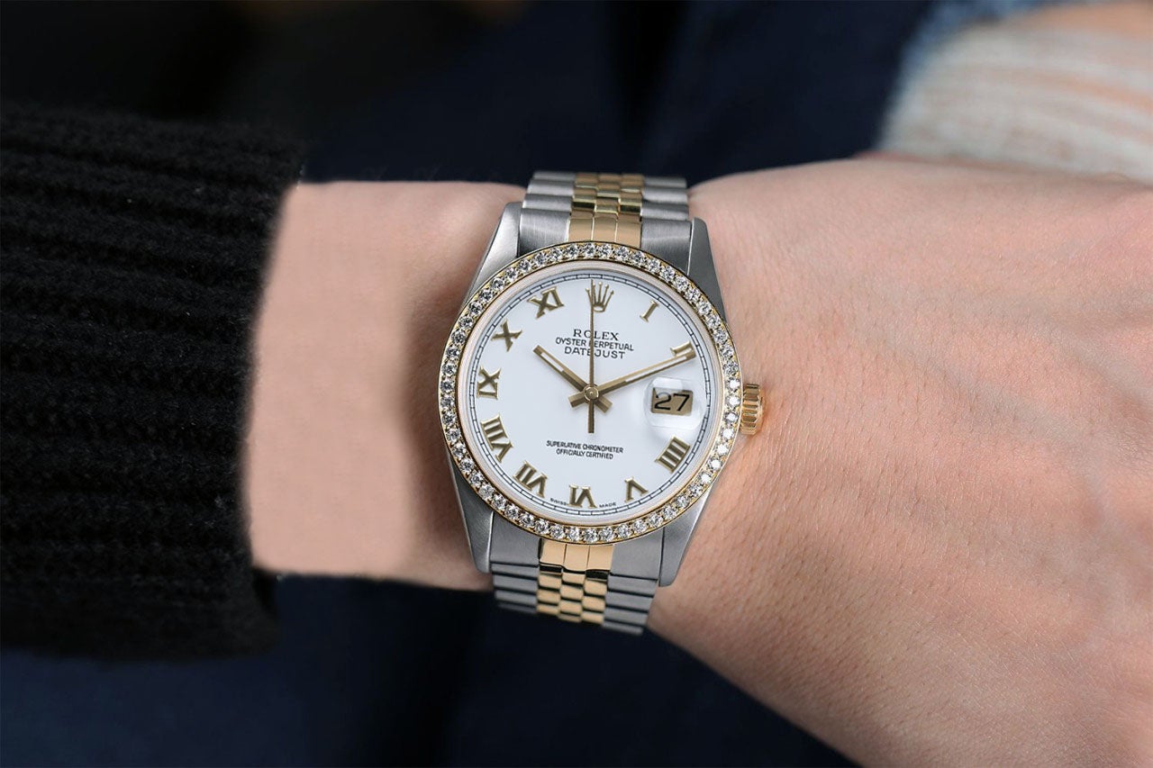 Rolex 36mm Datejust Diamond Bezel Cream Roman Dial Jubilee Band Two Tone Watch

We take great pride in presenting this timepiece, which is in impeccable condition, having undergone professional polishing and servicing to maintain its pristine