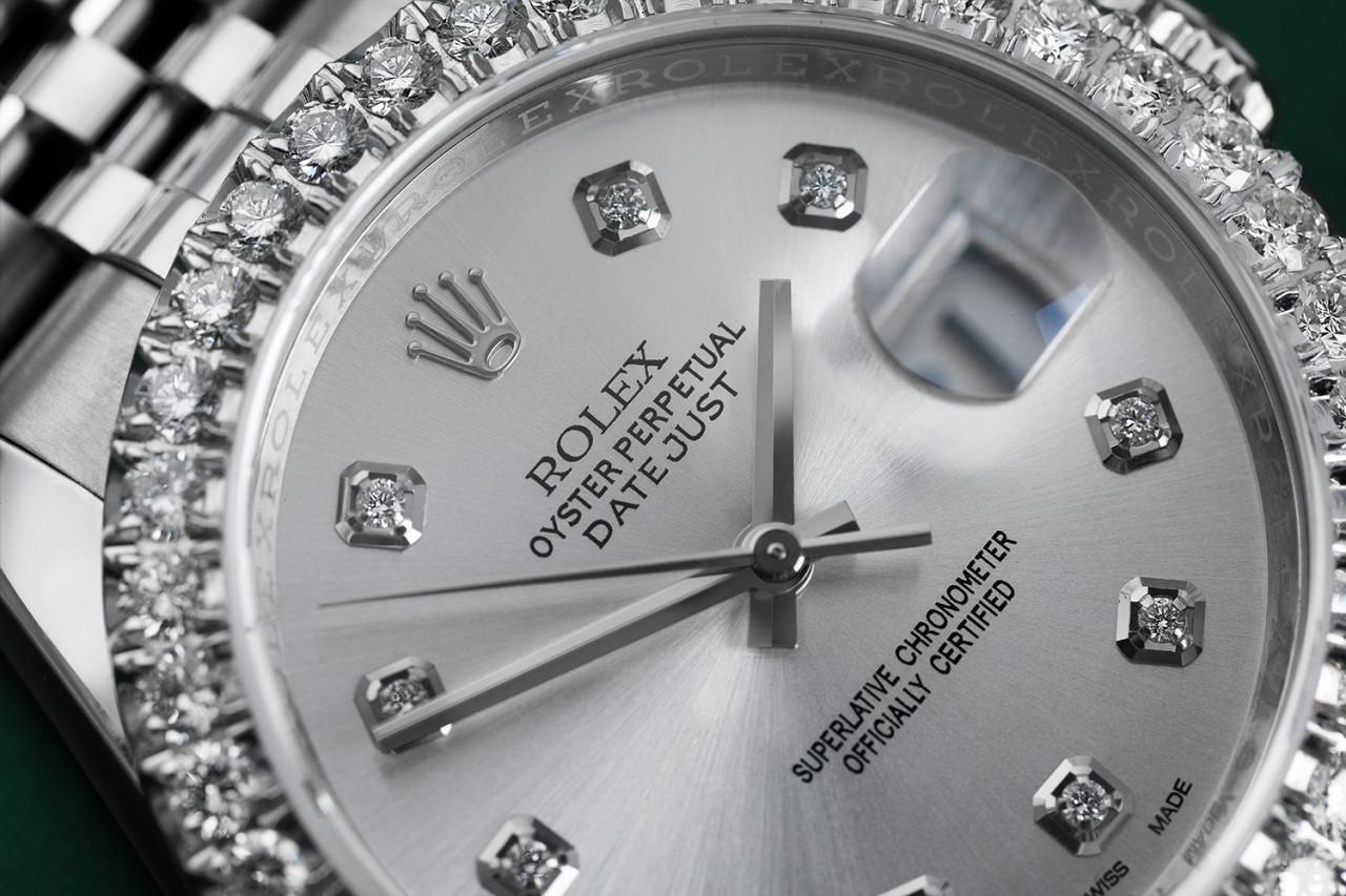 Rolex 36mm Datejust New Style Custom Diamond Bezel, Silver Diamond Dial 116234
This watch is in like new condition. It has been polished, serviced and has no visible scratches or blemishes. All our watches come with a standard 1 year mechanical