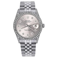 Rolex Montre Datejust 36 mm en acier inoxydable, cadran argenté et diamants avec lunette et cornes 