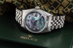 Rolex Montre Datejust 36 mm en acier inoxydable avec cadran en nacre de Tahiti et diamants 16030