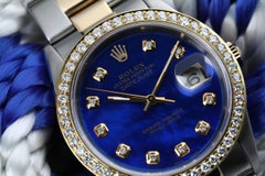 Rolex Montre Datejust bicolore en nacre bleue traitée MOP