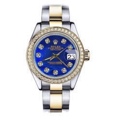 Rolex Montre Datejust bicolore en nacre bleue traitée MOP