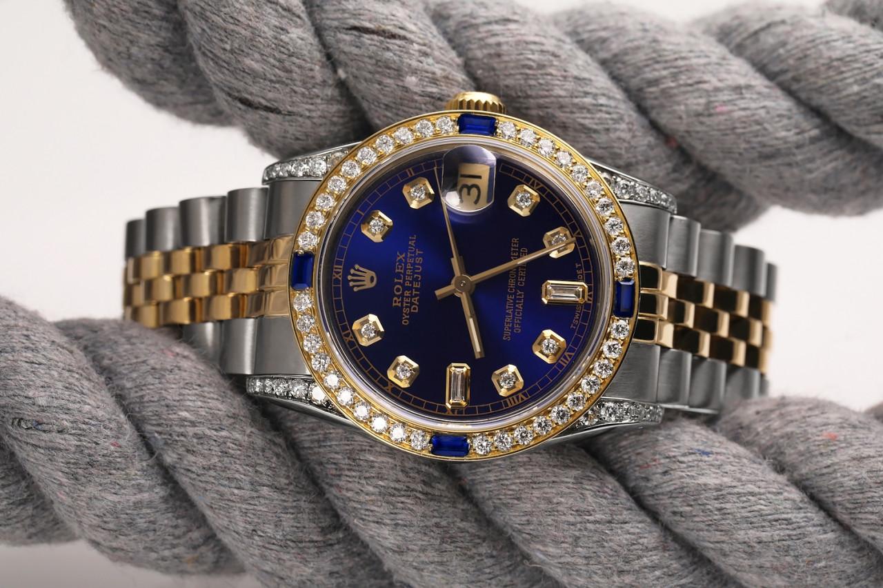 Men's Rolex 36mm Datejust 16013 Two Tone Jubilee Blue Color Dial 8+2 Diamond Accent Bezel + Lugs + Sapphire.
This watch is in like new condition. It has been polished, serviced and has no visible scratches or blemishes. All our watches come with a