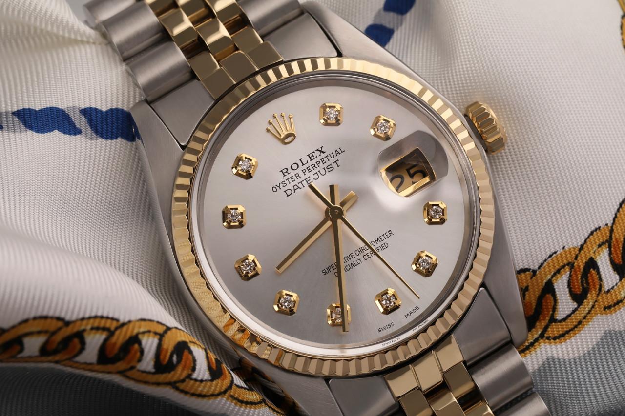 Rolex Datejust 36mm Custom Silver Diamond Dial. Two Tone Watch with Jubilee Band 16013

This watch is in like new condition. It has been polished, serviced and has no visible scratches or blemishes. All our watches come with a standard 1 year