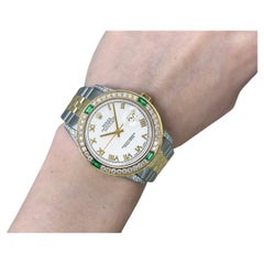 Used Rolex Datejust White Roman Dial with Diamond Lugs & Diamond/Emerald Bezel
