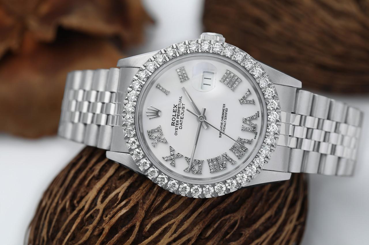 Rolex 36mm Datejust Custom Diamond Bezel, White Roman Dial 16014
This watch is in like new condition. It has been polished, serviced and has no visible scratches or blemishes. All our watches come with a standard 1 year mechanical warranty and