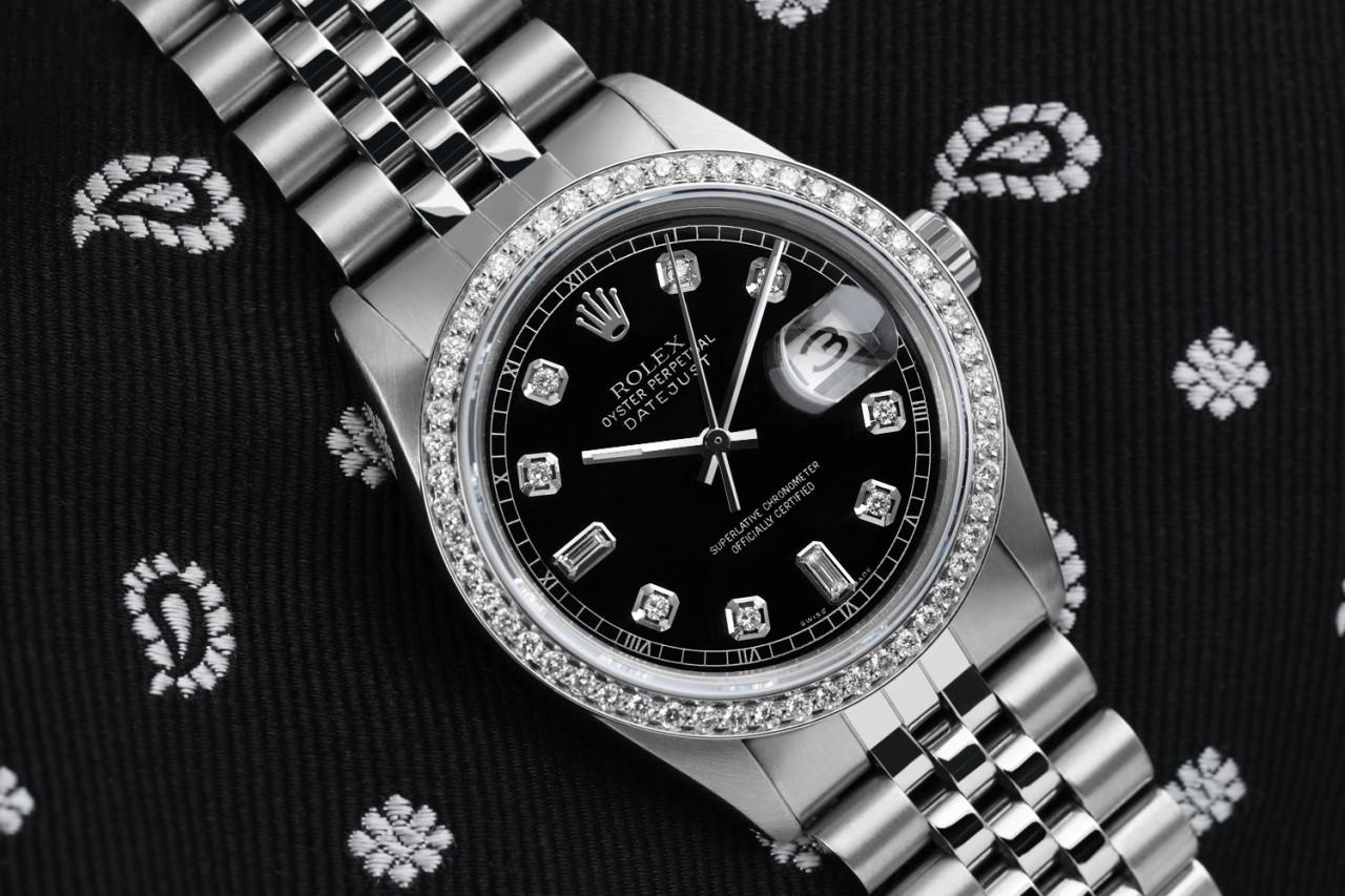 Rolex 36mm Oyster Perpetual Datejust 16030 Schwarzes Zifferblatt mit Diamant-Zahlen & Lünette römischen Ziffern Track.
Diese Uhr ist in neuwertigem Zustand. Es wurde poliert, gewartet und hat keine sichtbaren Kratzer oder Flecken. Alle unsere Uhren