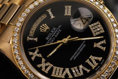 Rolex Presidential 18kt Gold Black Roman Diamond Numeral Dial Diamond Bezel