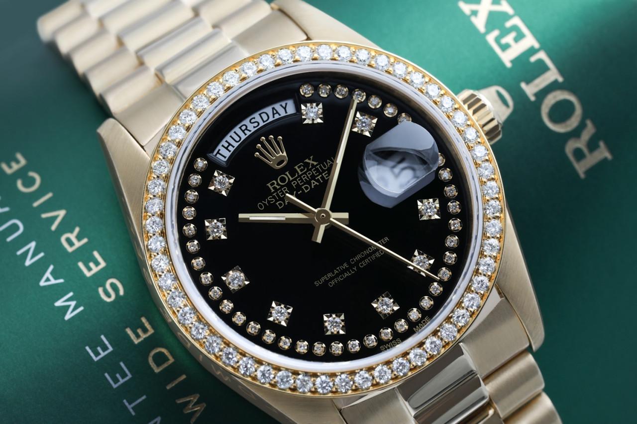 Rolex 36mm Presidential 18kt Gold Black String Diamond Dial Diamond Bezel 18038
This watch is in like new condition. It has been polished, serviced and has no visible scratches or blemishes. All our watches come with a standard 1 year mechanical