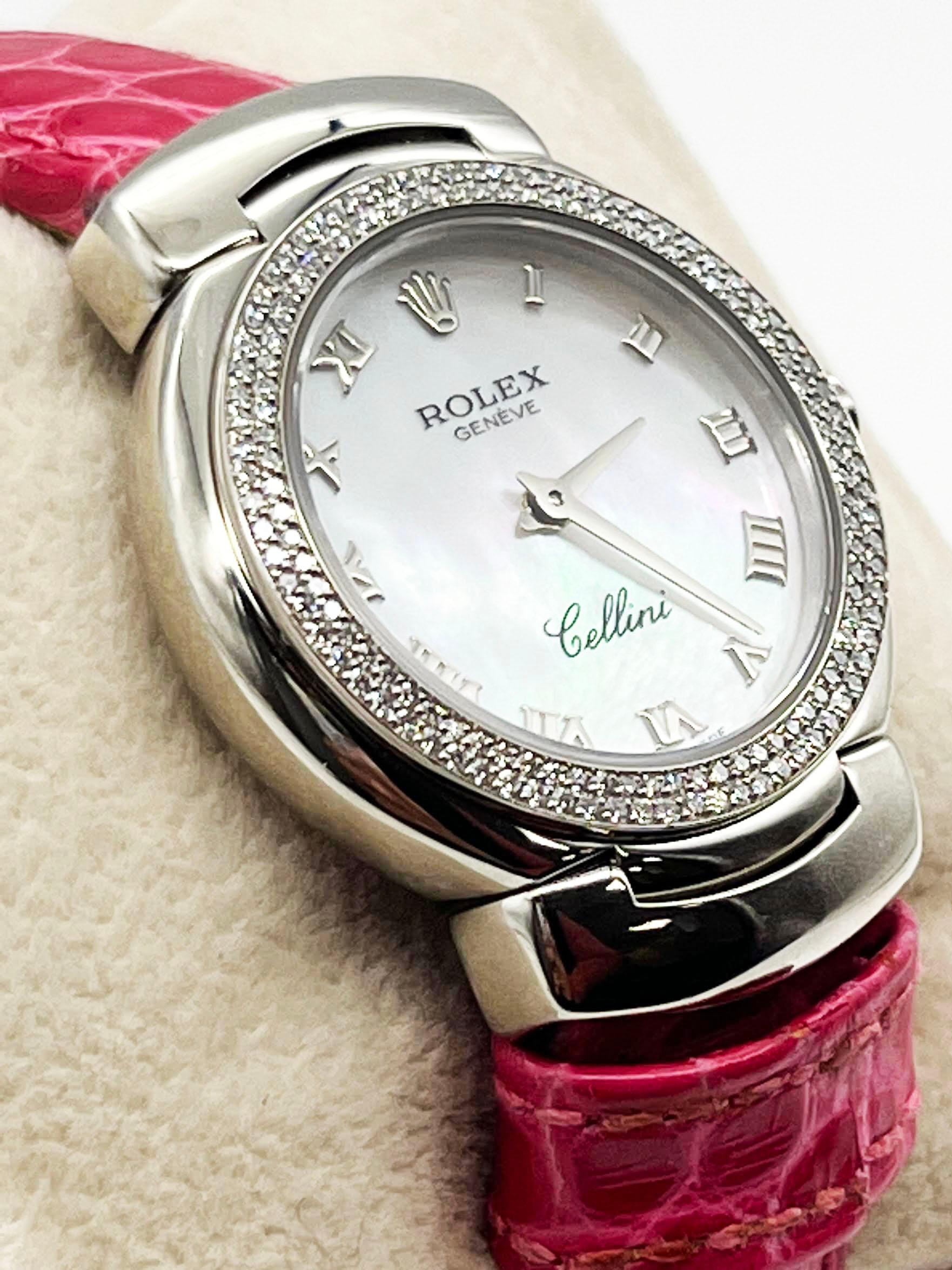 Style Number: 6671

Serial: D755***

Year: 2005

Model: Cellini Cellisma

Case Material: 18K White Gold 

Band: Pink Leather Band

Bezel: 18K White Gold

Dial: White Mother of Pearl 

Face: Sapphire Crystal 

Case Size: 26mm 

Includes: 

-Elegant