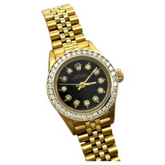 Rolex 67198 Ladies Oyster Perpetual 18K Yellow Gold Diamond Bezel