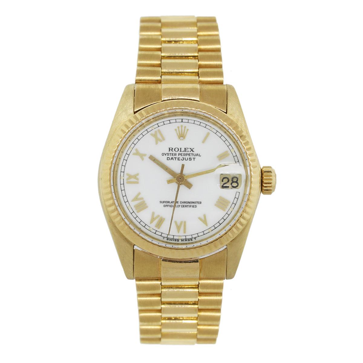 Brand: Rolex
MPN: 6827
Model: Datejust
Case Material: 18k yellow gold
Case Diameter: 31mm
Crystal: Sapphire crystal (scratch resistant)
Bezel: 18k yellow gold fluted bezel
Dial: White roman dial with gold roman hour markers
Bracelet: 18k yellow gold