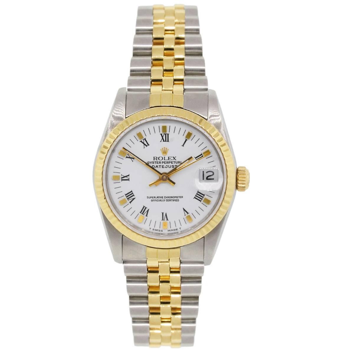 Brand: Rolex
MPN: 68273
Model: Datejust (midsize)
Case Material: Stainless steel
Crystal: Sapphire
Case Diameter: 31mm
Bezel: Fixed Fluted bezel
Dial: White roman dial with date at 3 o’clock
Bracelet: Two tone stainless steel and 18k yellow gold