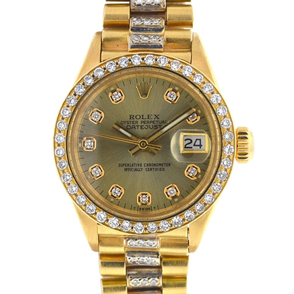 Company - Rolex
Model - 6917 Ladies President
Case Metal - 18k Yellow Gold
Case Measurement - 26mm
Bracelet - Custom 18k Yellow Gold w/ Diamonds
Dial - Custom Champagne Diamond Dial
Bezel - Custom Diamond Bezel
Crystal - Plastic
Movement -