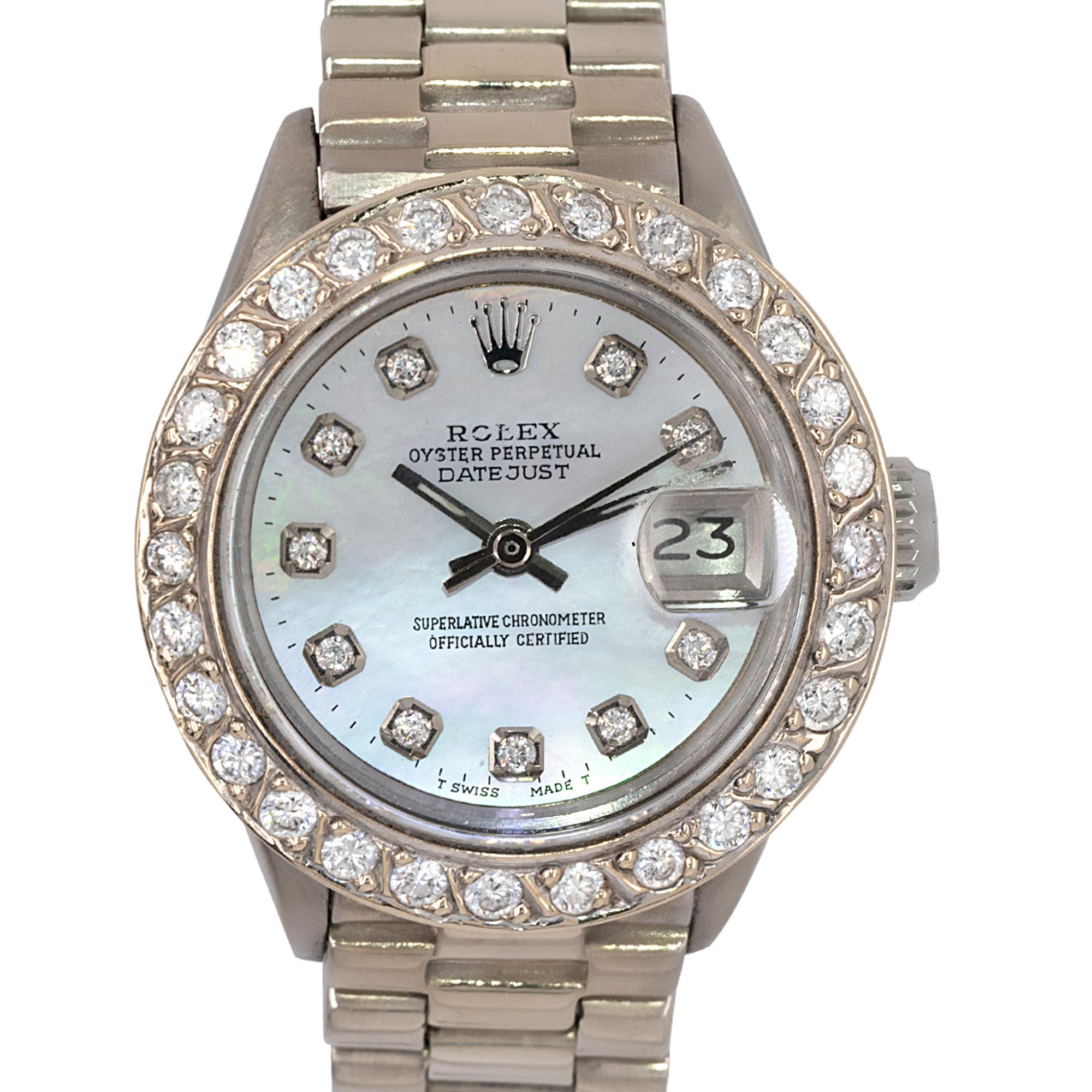 Rolex 6917 18k White Gold Datejust Mother of Pearl Dial and Diamond Bezel Ladies Watch

Indulge in the timeless beauty of the Rolex 6917 Datejust watch, a true symbol of refined luxury. Crafted with meticulous attention to detail, this exquisite