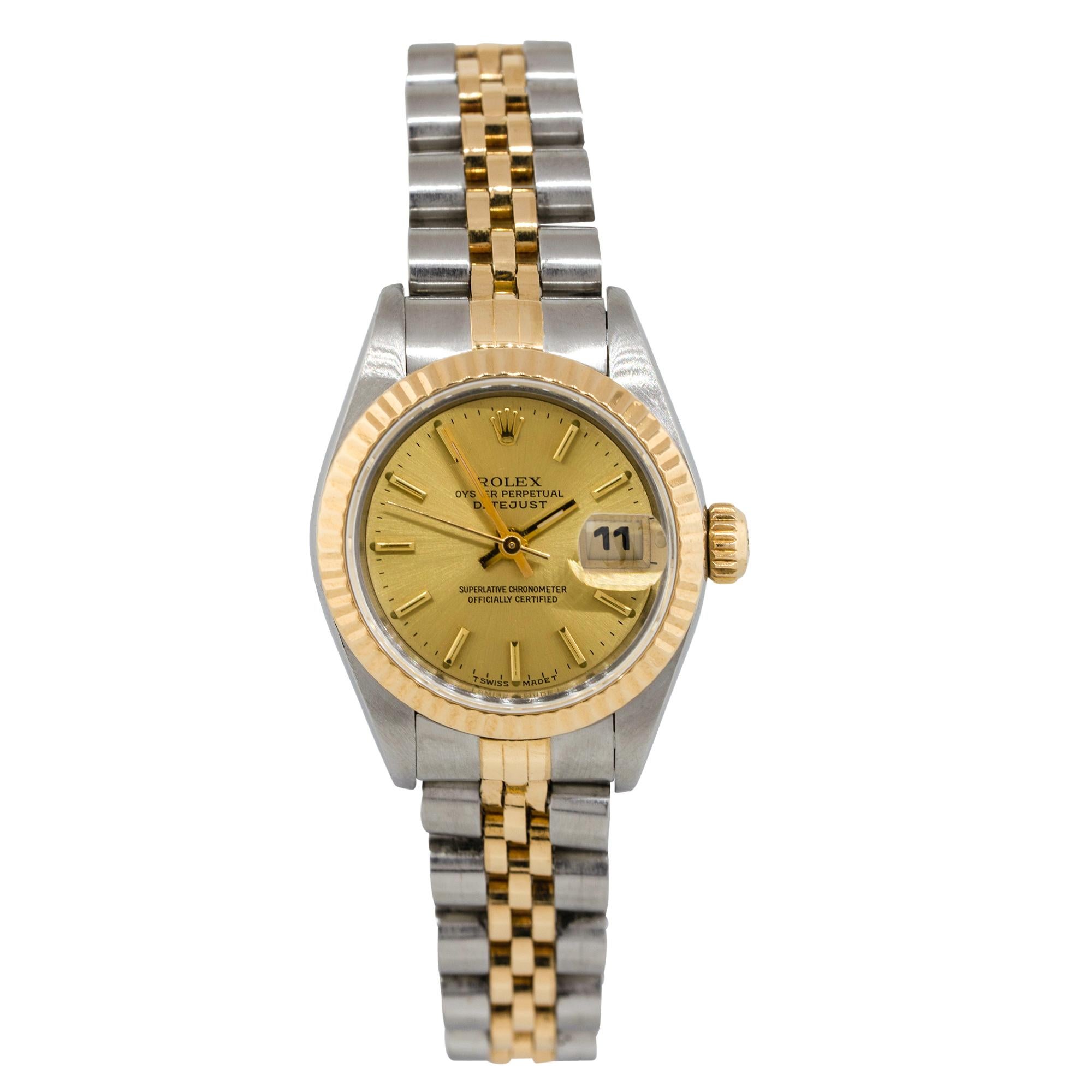 Brand: Rolex
MPN: 6917
Model: Datejust
Case Material: Stainless steel
Case Diameter: 26mm
Crystal: Plastic crystal
Bezel: 18k Yellow gold fluted bezel 
Dial: Champagne dial with yellow gold hands and gold hour stick markers. Date can be found at 3