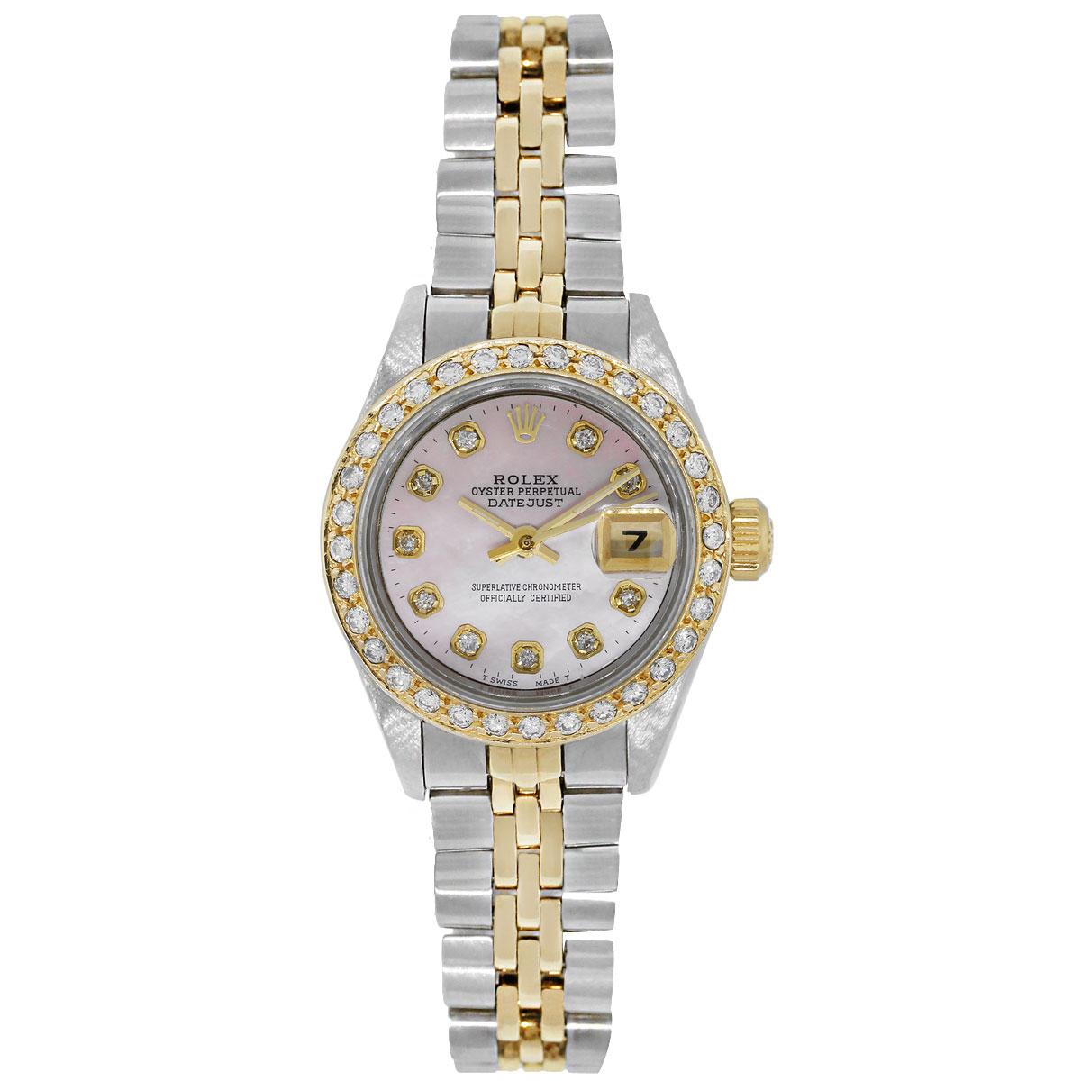 Brand: Rolex
MPN: 69173
Model: Datejust
Case Material: Stainless Steel and 18k yellow gold
Case Diameter: 26mm
Bezel: 18k Yellow gold diamond bezel
Dial: Pink pearl diamond dial with gold hour and minute hands. Date is displayed at the 3 o’clock