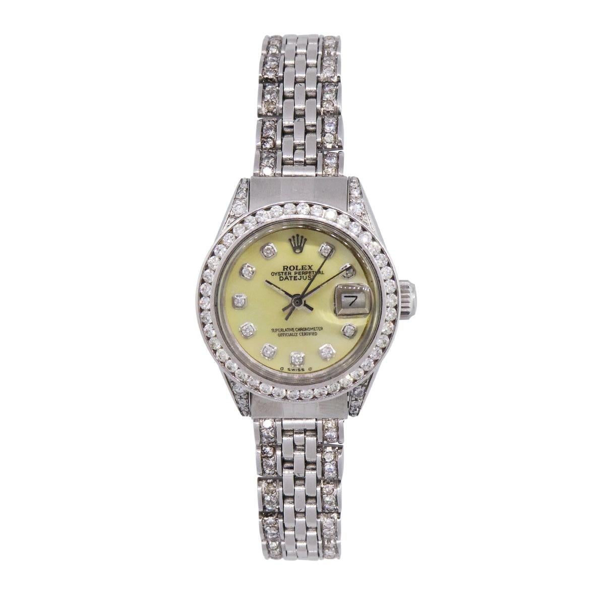 Brand: Rolex
MPN: 69173
Model: Datejust
Case Material: Stainless steel
Case Diameter: 26mm
Bezel: Diamond bezel (aftermarket)
Dial: Mother of pearl diamond dial (aftermarket)
Bracelet: Stainless steel diamond jubilee band (aftermarket)
Crystal: