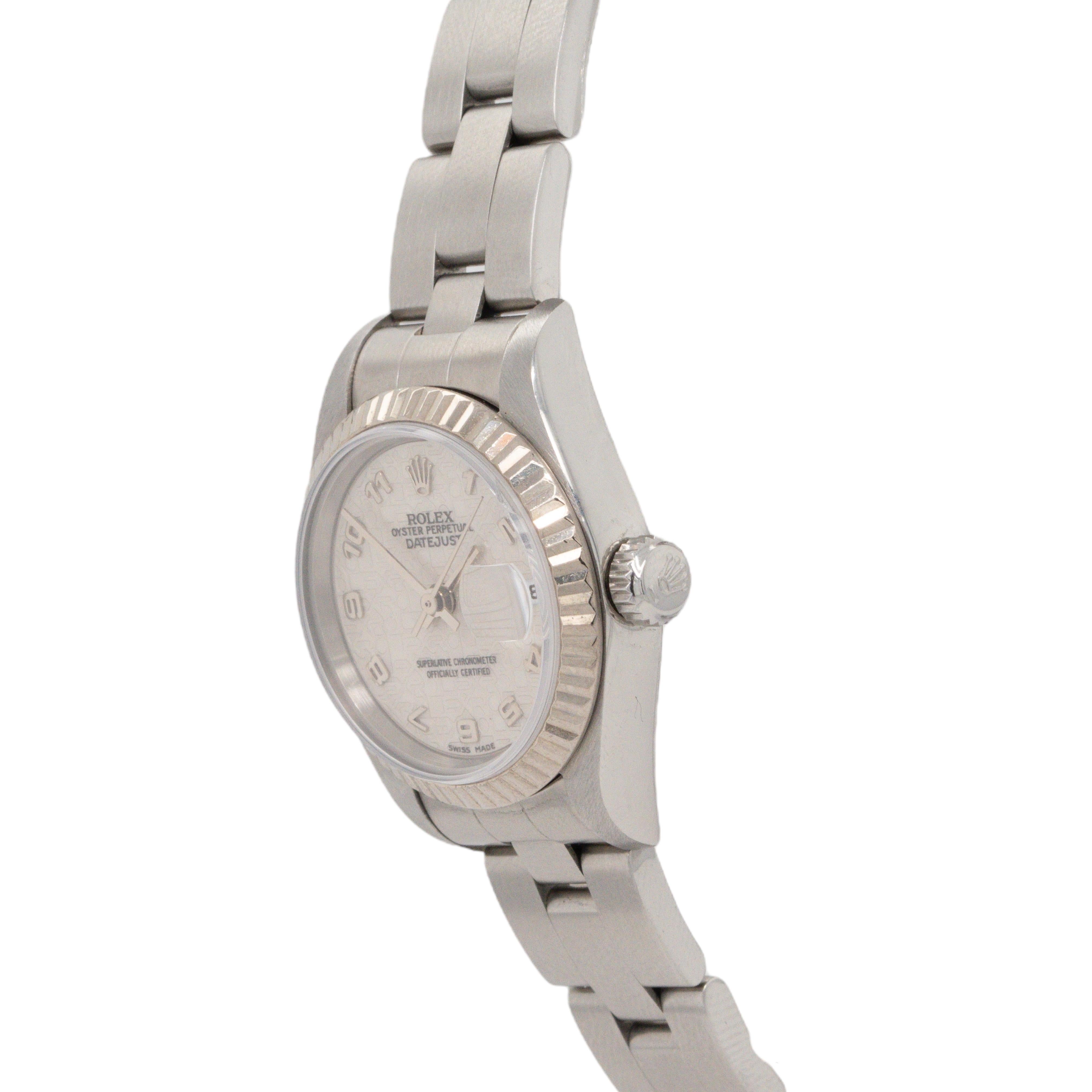 This Rolex 69174 Datejust features a 26mm stainless steel case with a striking white 