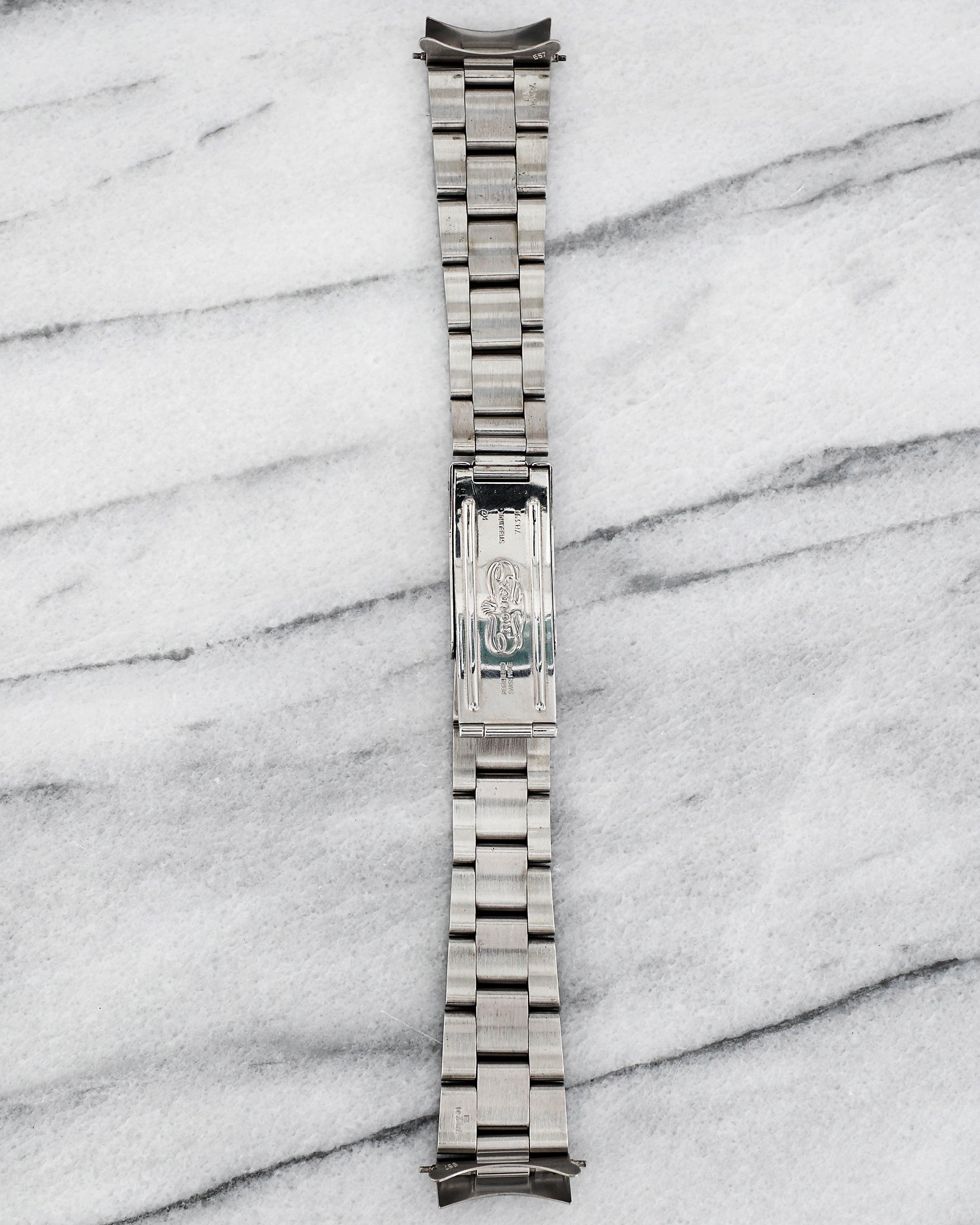 Aquí tienes un brazalete Rolex vintage Oyster pesado con código 78350 de la década de 1990, con un ancho de orejeta de 19 mm. Fabricado en acero inoxidable cepillado, se adapta a cajas Rolex de 34 mm como la Air-King y la Oyster Perpetual Date.