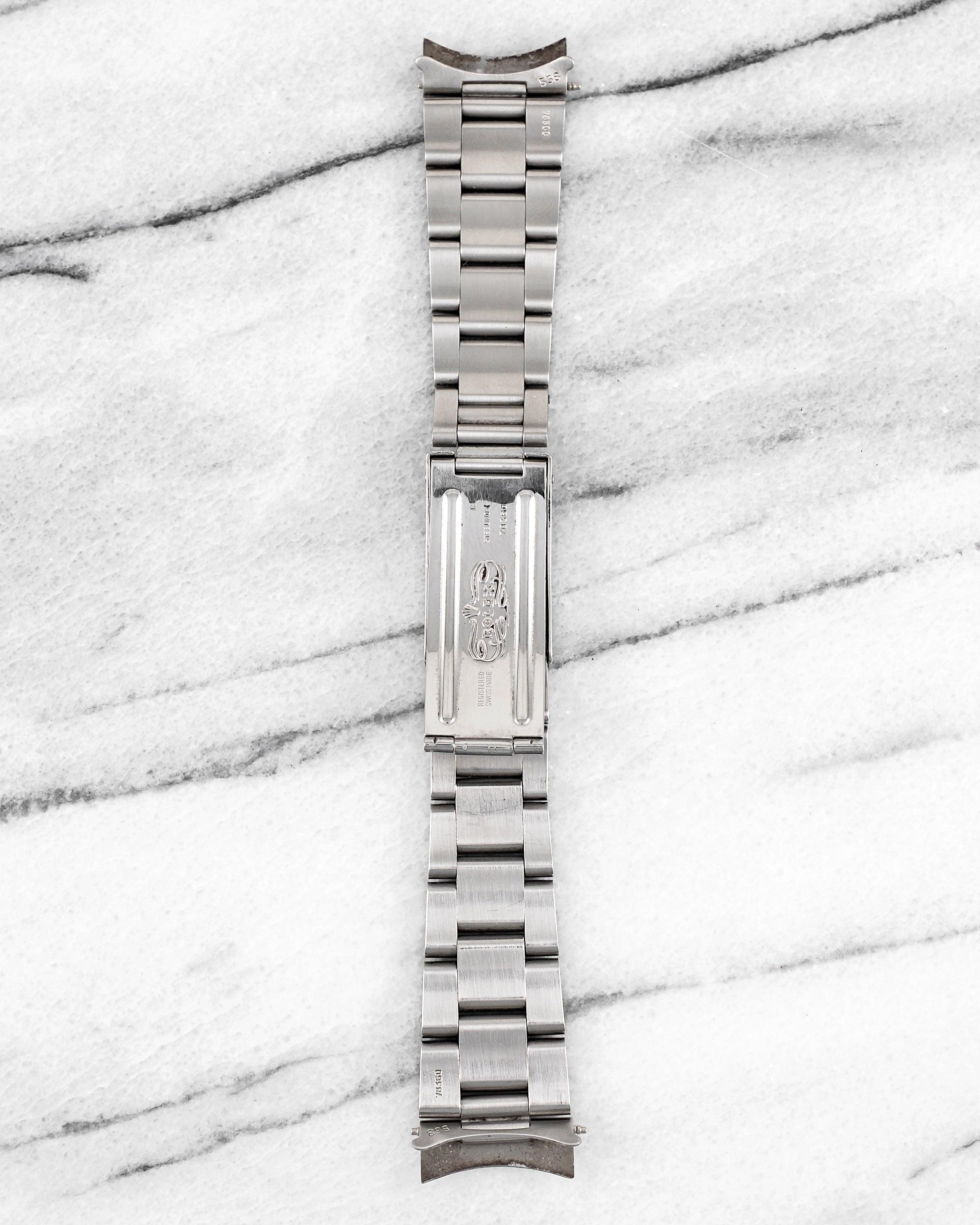 Here's a vintage Rolex heavy Oyster bracelet reference 78360 with 558 endlinks and 20mm lug width. Made of stainless steel with brushed finish and signed clasp. Fits up to a 7 inch wrist. The bracelet has some stretch from wear over time but remains