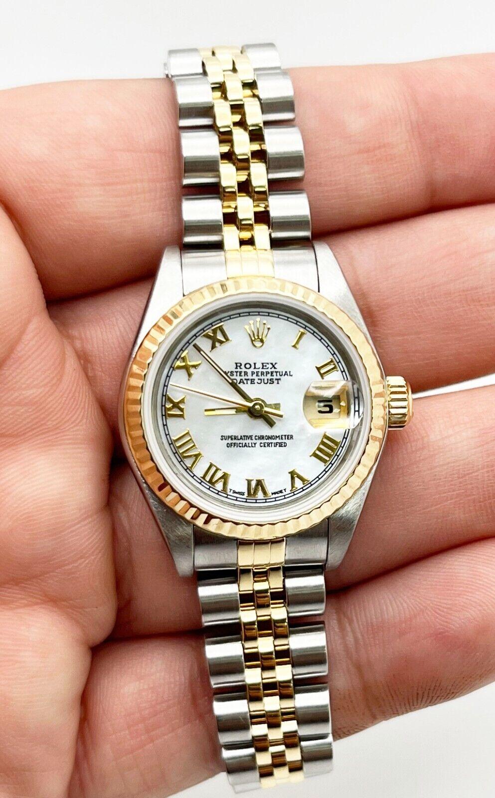 Style Number: 79173

Serial: Y947***

Year: 2002
 
Model: Ladies Datejust 
 
Case Material: Stainless Steel 
 
Band: 18K Yellow Gold & Stainless Steel 
 
Bezel: 18K Yellow Gold 
 
Dial: Refinished White Mother of Pearl Roman Numeral Dial 
 
Face:
