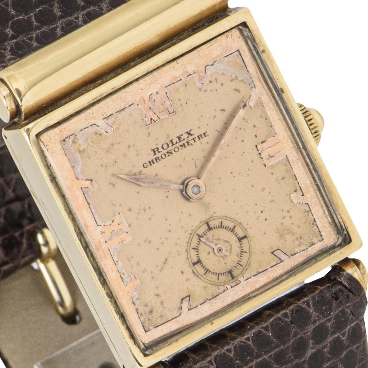 small gold rolex