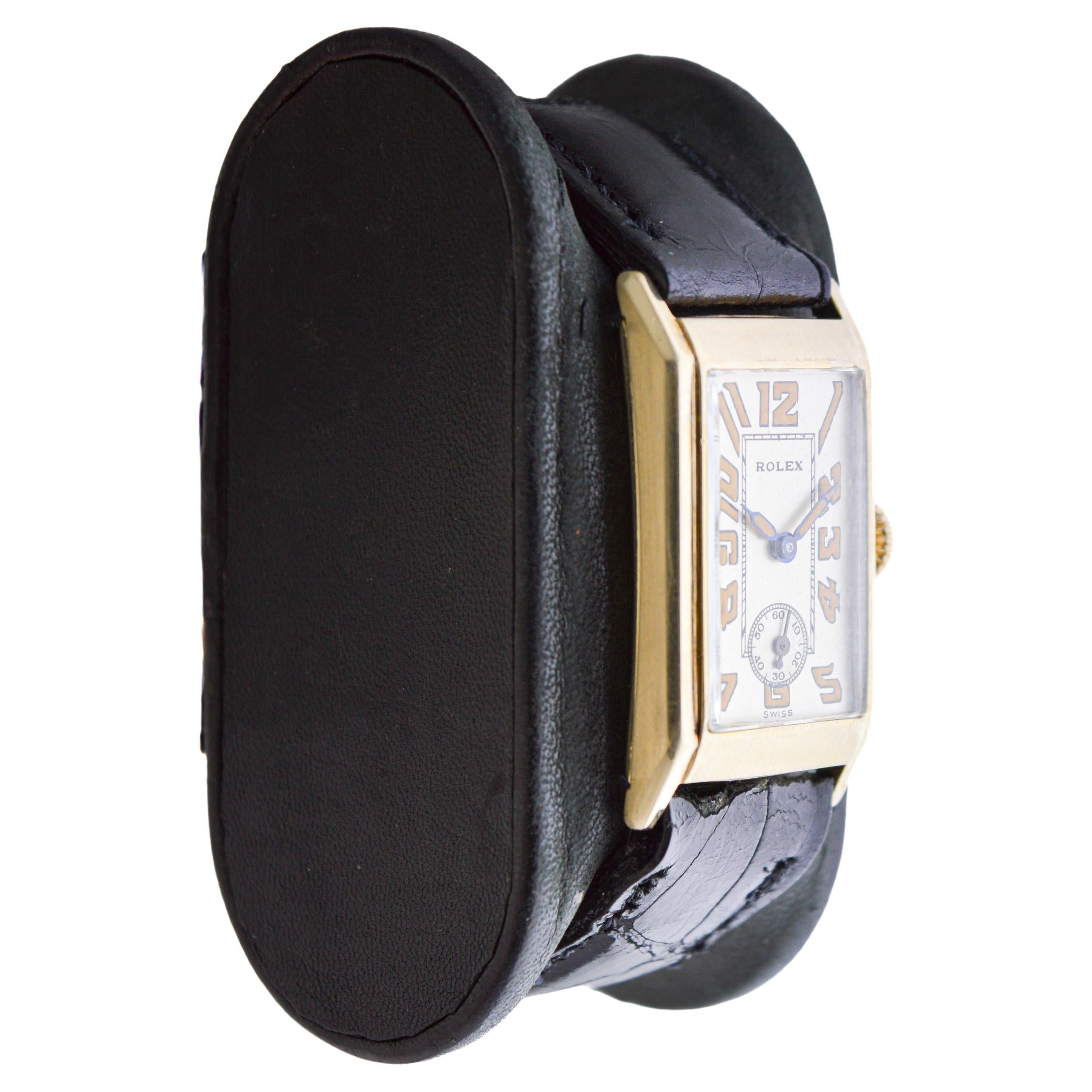 FACTORY / HOUSE: Rolex Watch Company
STYLE / REFERENCE: Art Deco Tank 
METAL / MATERIAL: 9Kt Solid Gold 
CIRCA / YEAR: Early 1920's
DIMENSIONS / SIZE: Length 36mm X Width 20mm
MOVEMENT / CALIBER: Manual Winding / 15 Jewels / Caliber P
DIAL / HANDS:
