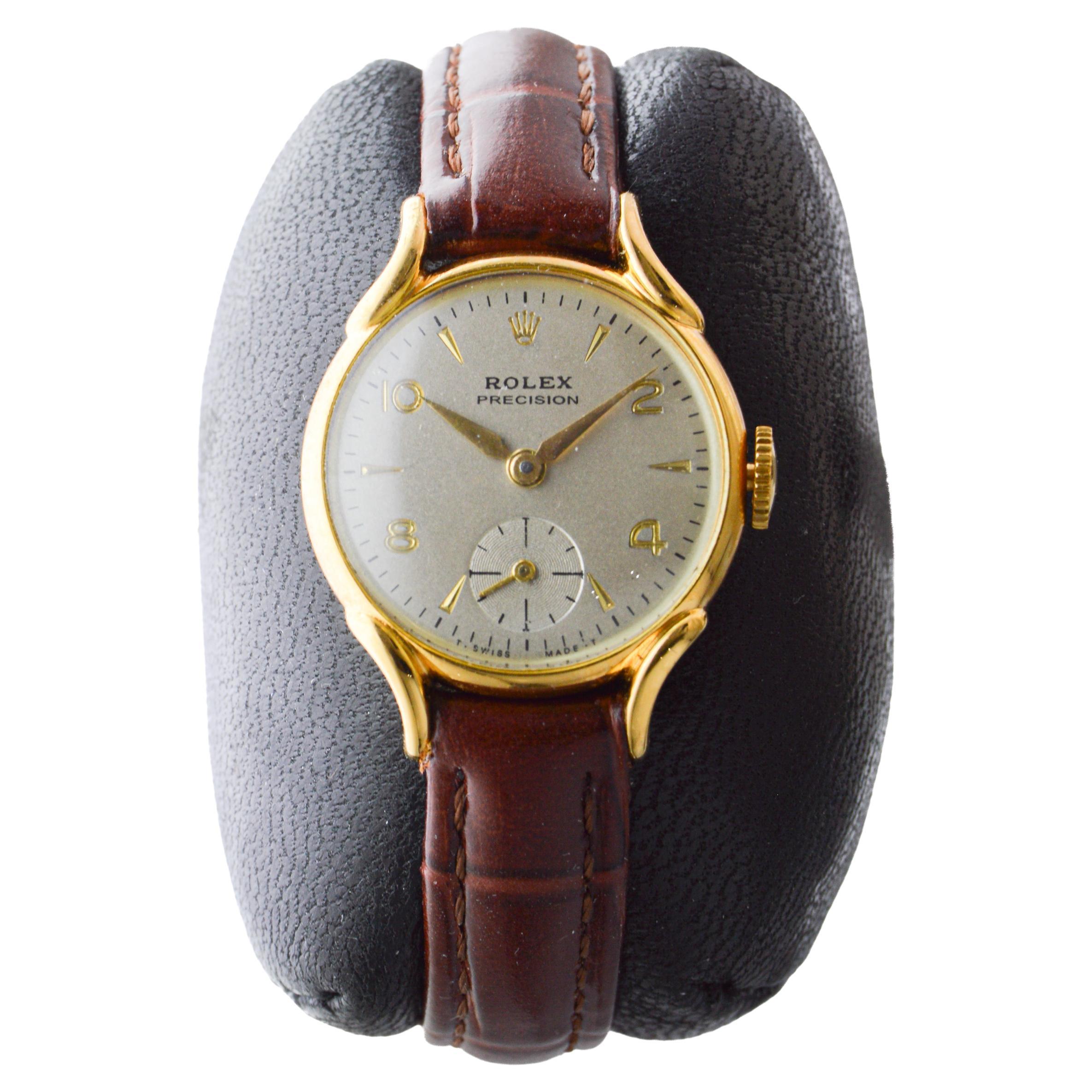 Reloj Rolex redondo de oro macizo de 9 quilates de mediados de siglo circa años 50