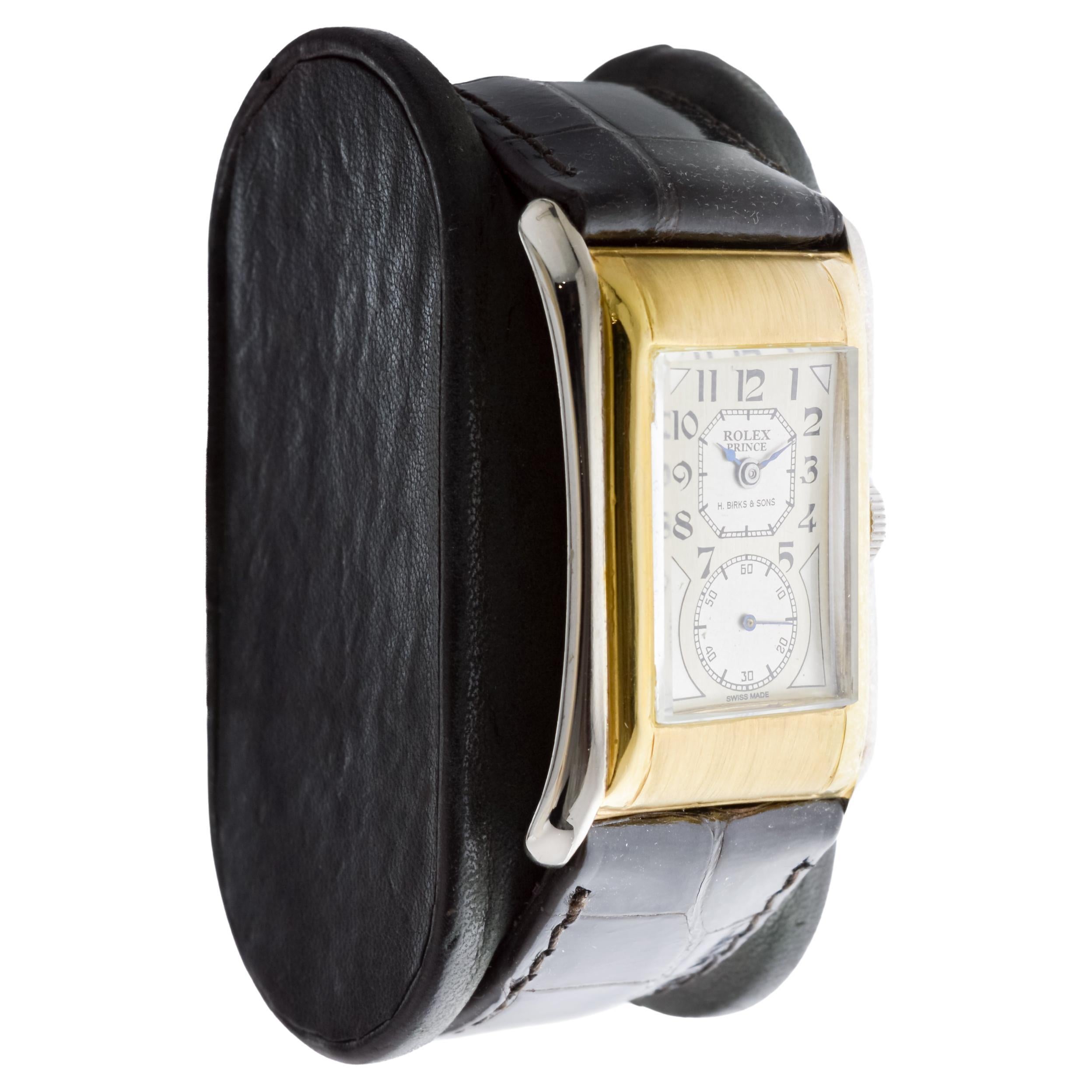 FACTORY / HOUSE: Rolex Watch Company
STYLE / REFERENCE: Prince / Reference 971
METAL / MATERIAL: 9Kt Two Tone Solid Gold
CIRCA / YEAR: 1938
DIMENSIONS / SIZE: Length 42mm X Width 26mm
MOVEMENT / CALIBER: Manual Winding / 15 Jewels  
DIAL / HANDS: