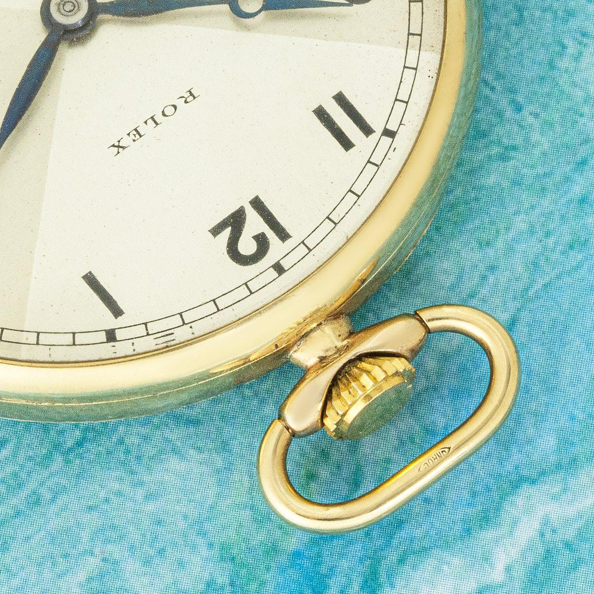 Rolex. Eine seltene Bow TIe Zifferblatt 9ct Gelbgold offenes Gesicht schlüssellose Hebel Taschenuhr C1930s

Zifferblatt: Die ursprüngliche seltene Silber zwei Ton satiniert Fliege Zifferblatt signiert Rolex mit arabischen Ziffern und