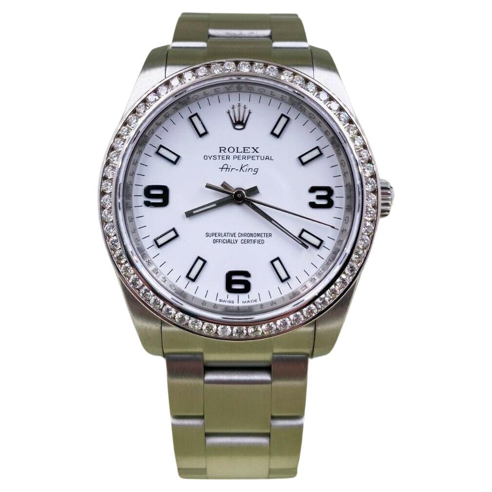 Rolex Montre Air King 114200 avec cadran blanc et lunette en acier inoxydable avec diamants