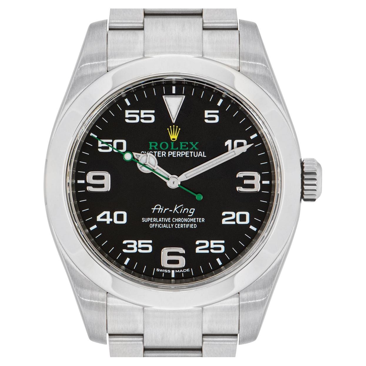 A mens 40mm Air-King in Oystersteel by Rolex. Featuring a distinctive black dial with a smooth fixed stainless steel bezel. The Oyster bracelet comes with a folding Oysterlock clasp which is equipped with the Easylink 5mm comfort extension link.