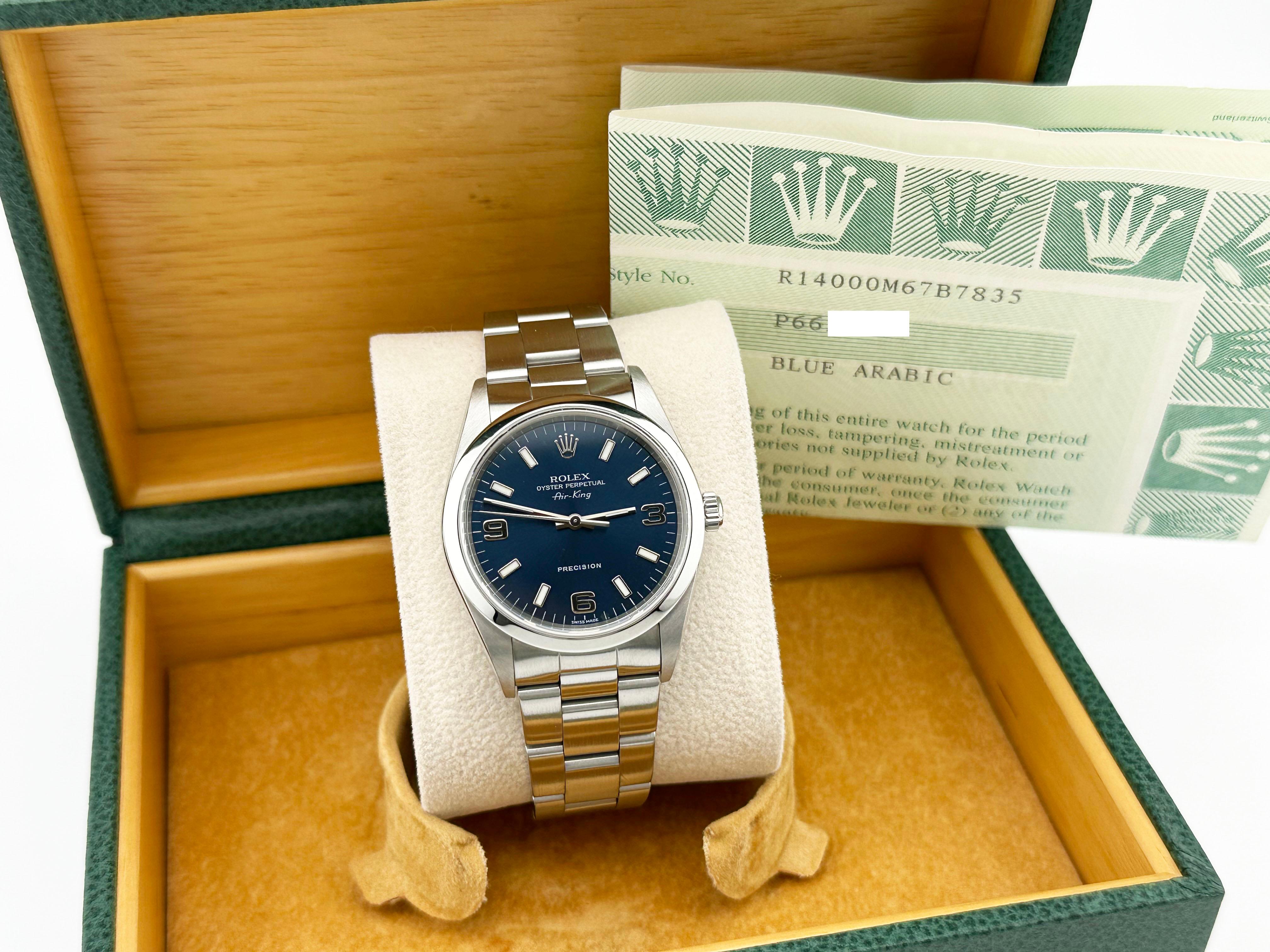 Style Number: 14000

Serial: P662***

Year: 2002

Model: Rolex Air King

Case Material: Stainless Steel 

Band: Stainless Steel 

Bezel: Stainless Steel 

Dial: Blue 

Face: Sapphire Crystal 

Case Size: 34mm 

Includes:

-Rolex Box &