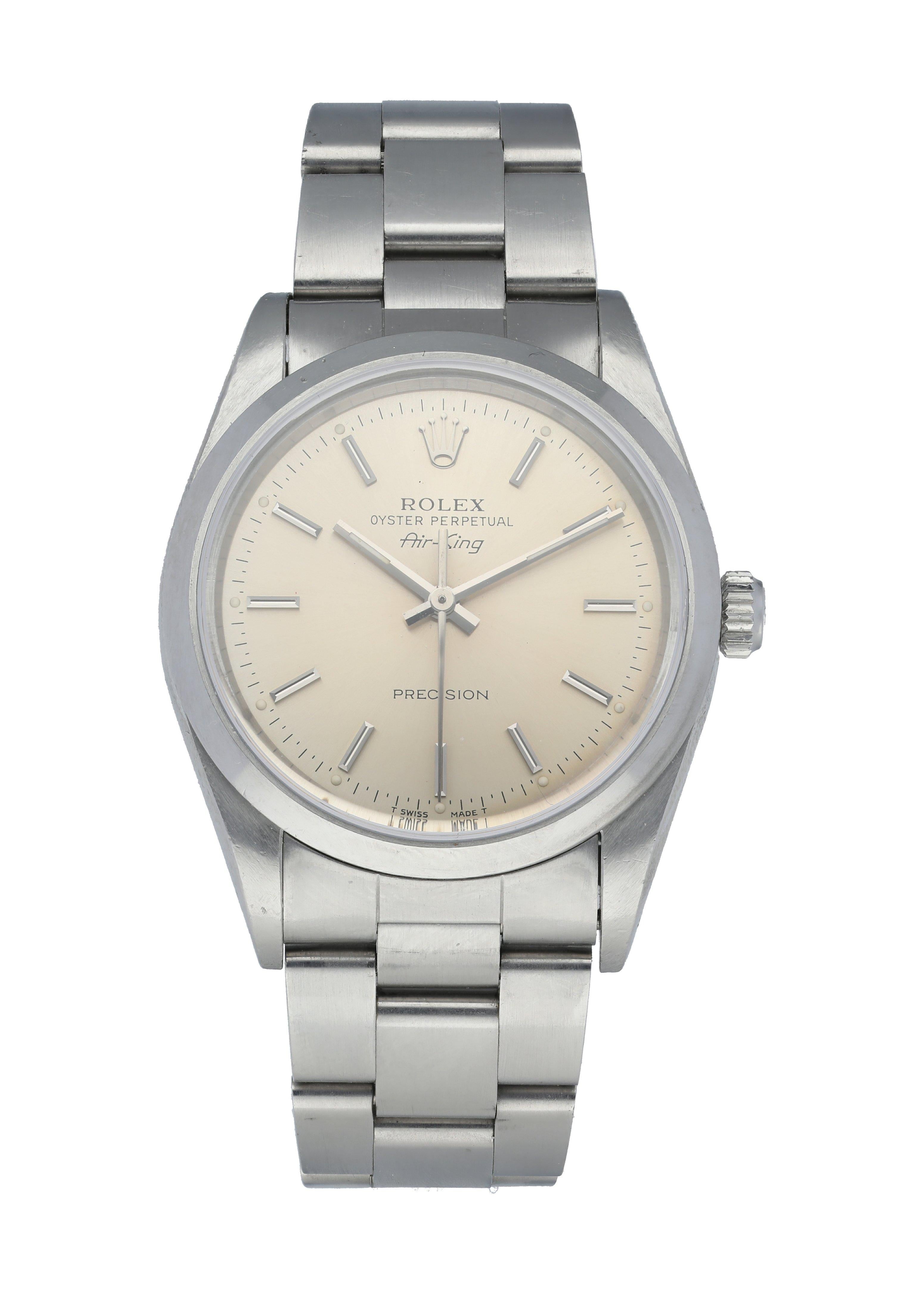 Rolex Air-King 14000 Men's Watch. 
34mm Stainless Steel case. 
Stainless Steel smooth bezel. 
Silver dial with steel hands and index hour markers. 
Minute markers on the outer dial. 
Stainless Steel Bracelet with Fold Over Clasp. 
Will fit up to a