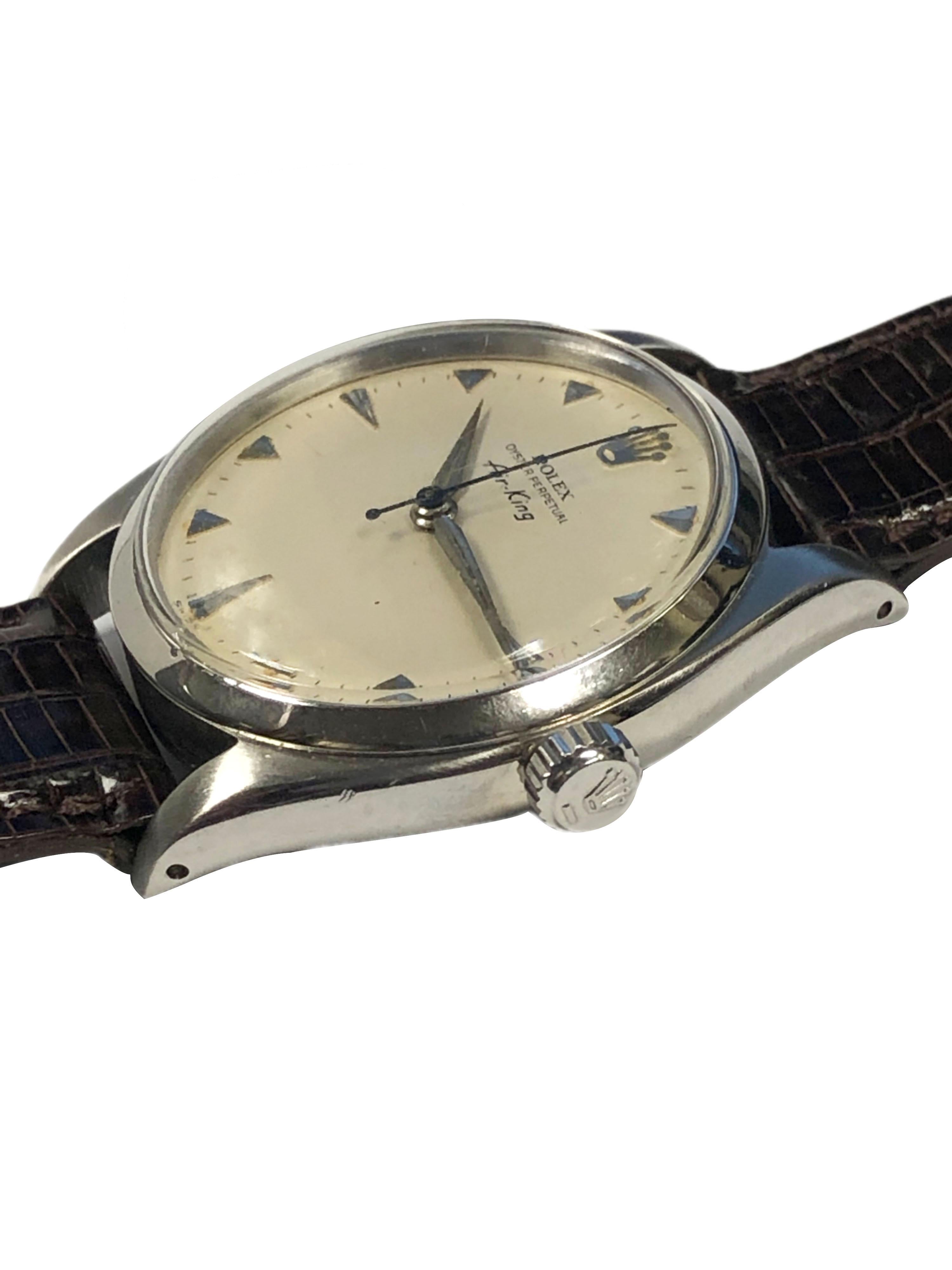 Circa 1946 Rolex Air King, Reference 5500 34 M.M. Stainless Steel 3 Piece Oyster case with Smooth Bezel and screw down Crown. Caliber 1500 17 Jewel mechanical, self winding movement. Original Near mint condition Silver Satin Dial with Scarce raised