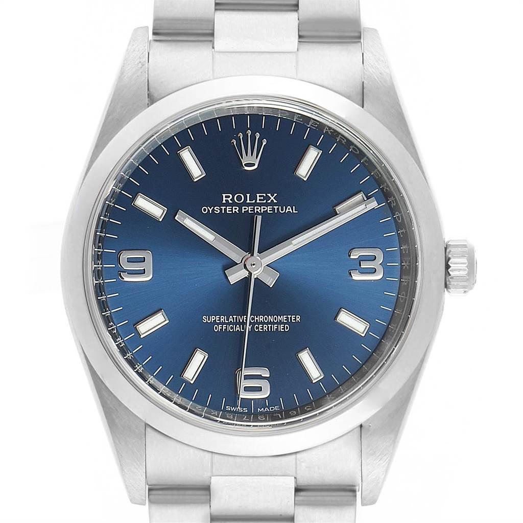 Rolex Air King 34 Blue Dial Smooth Bezel Unisex Watch 114200. Officially certified chronometer self-winding movement. Stainless steel case 34.0 mm in diameter.Rolex logo on a crown. Stainless steel smooth domed bezel. Scratch resistant sapphire