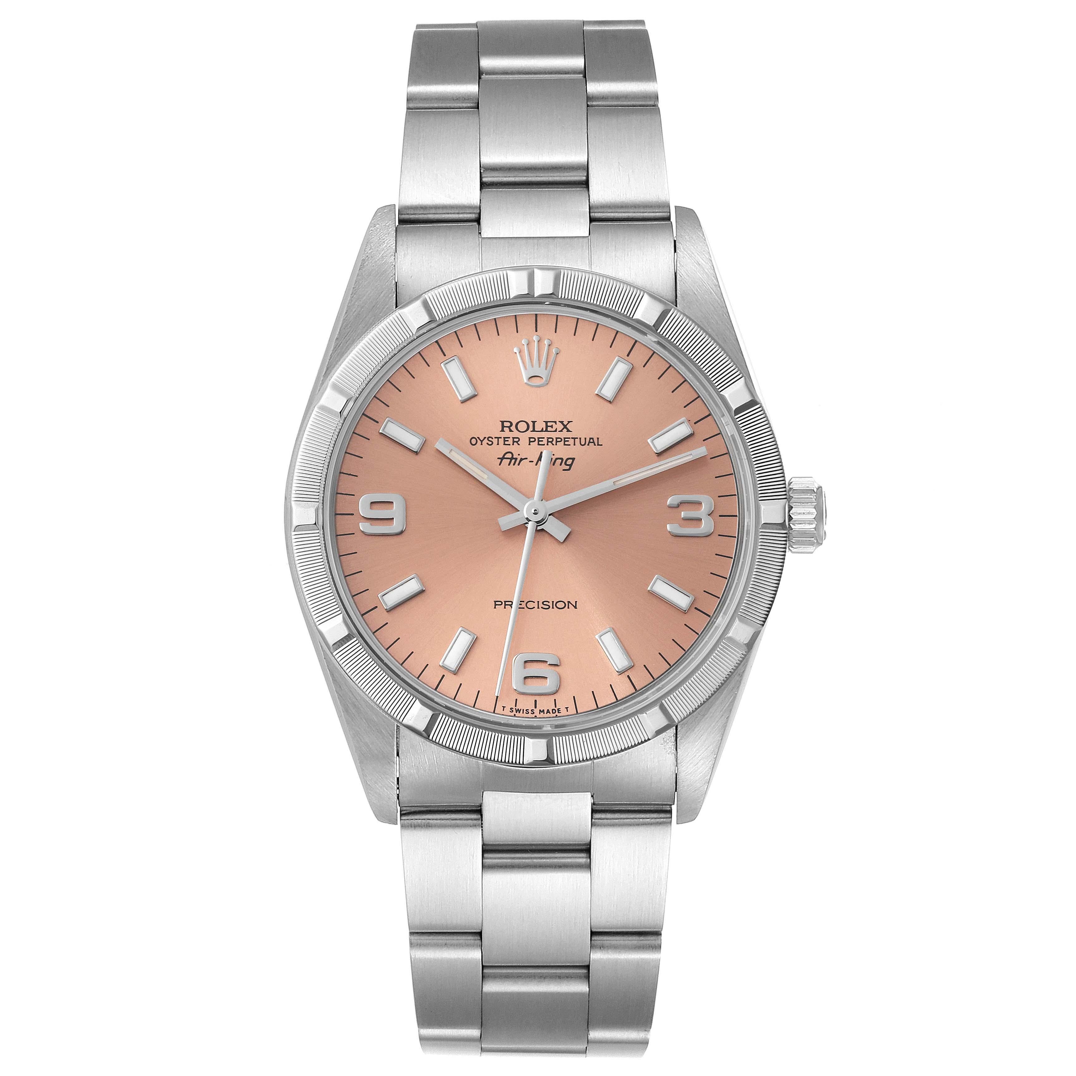 Rolex Air King 34 Salmon Dial Engine Turned Bezel Steel Mens Watch 14010. Automatic self-winding movement. Stainless steel case 34 mm in diameter. Rolex logo on the crown. Stainless steel engine turned bezel. Scratch resistant sapphire crystal.